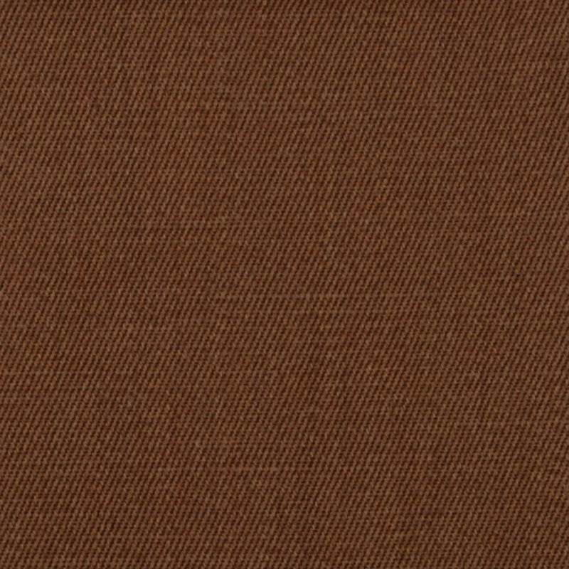 Cognac twill upholstery fabric close-up with diagonal weave and textured surface.