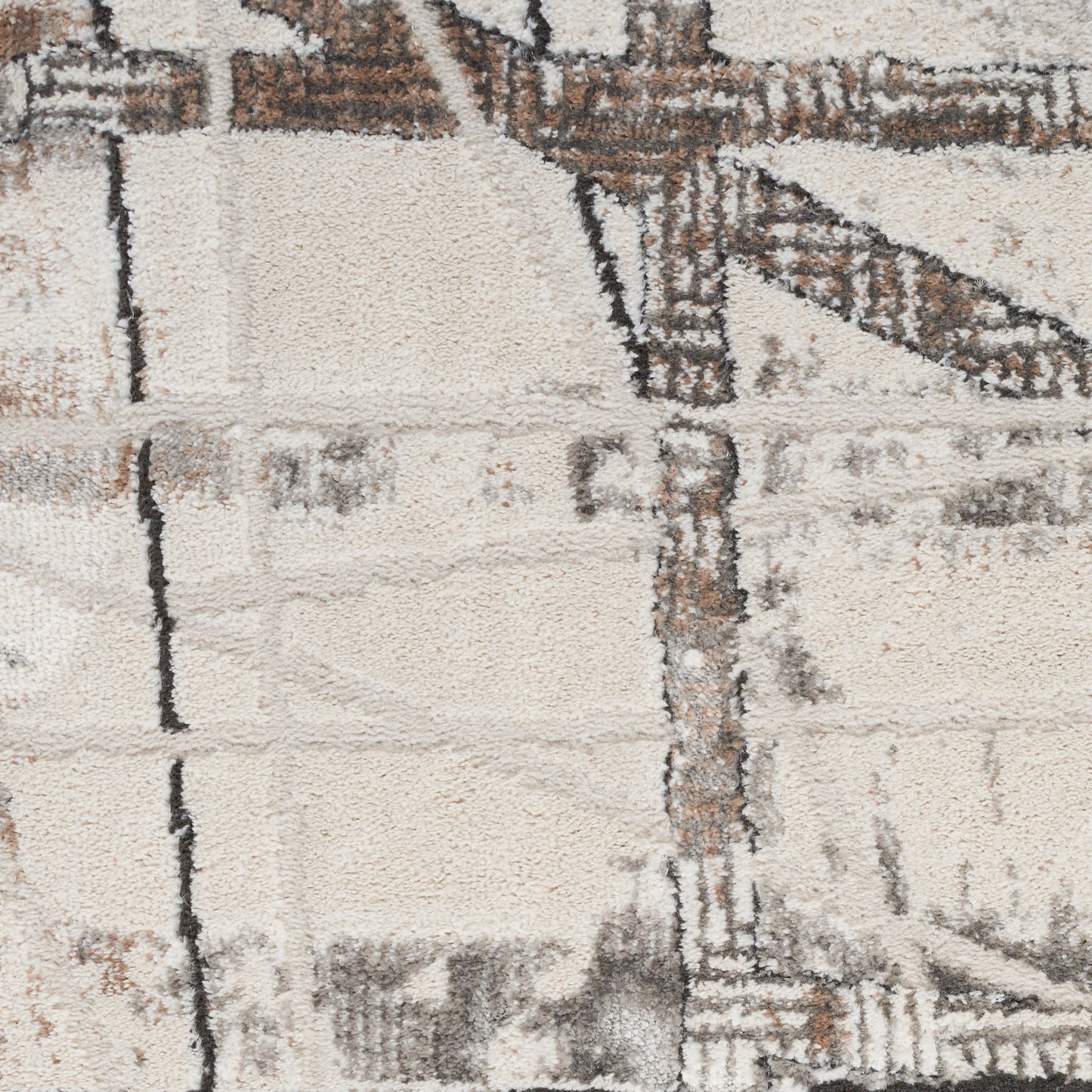 Rectangular beige rug with brown grid lines, distressed texture and plush pile.