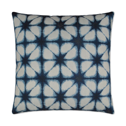 Square decorative pillow with navy blue tie-dye starburst lattice pattern on white fabric.