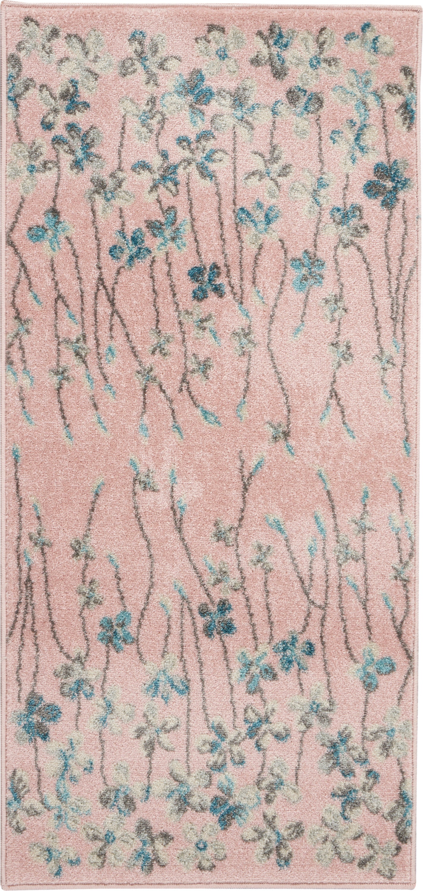 Soft pink floral area rug with blue and white blossoms along slender gray stems.