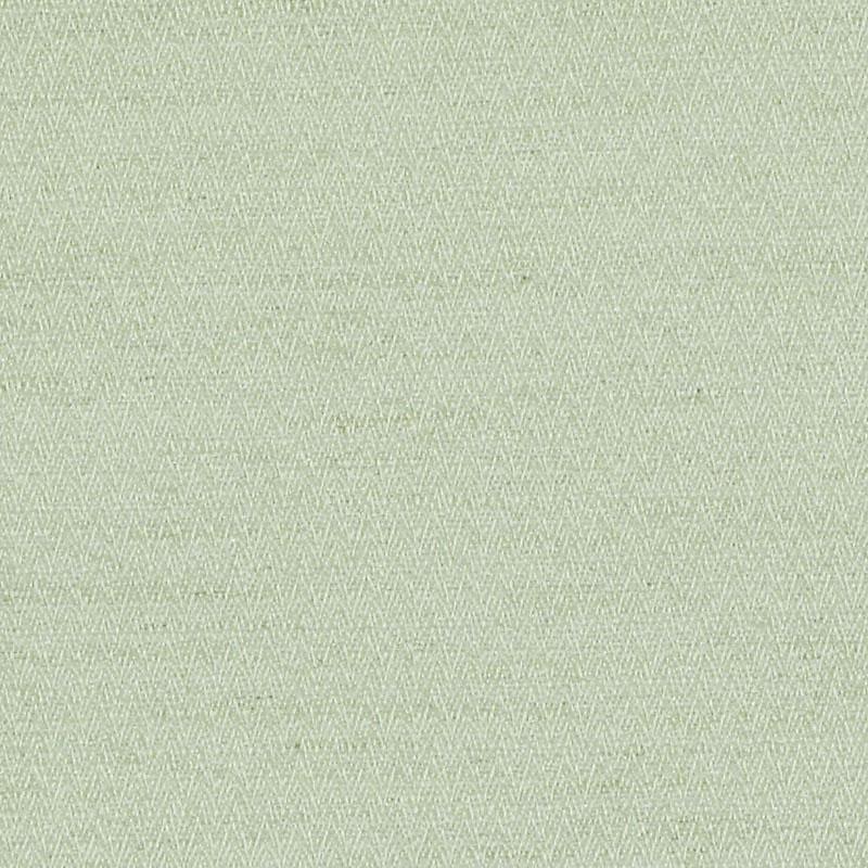 Light sage-green fabric close-up with a subtle chevron weave texture.