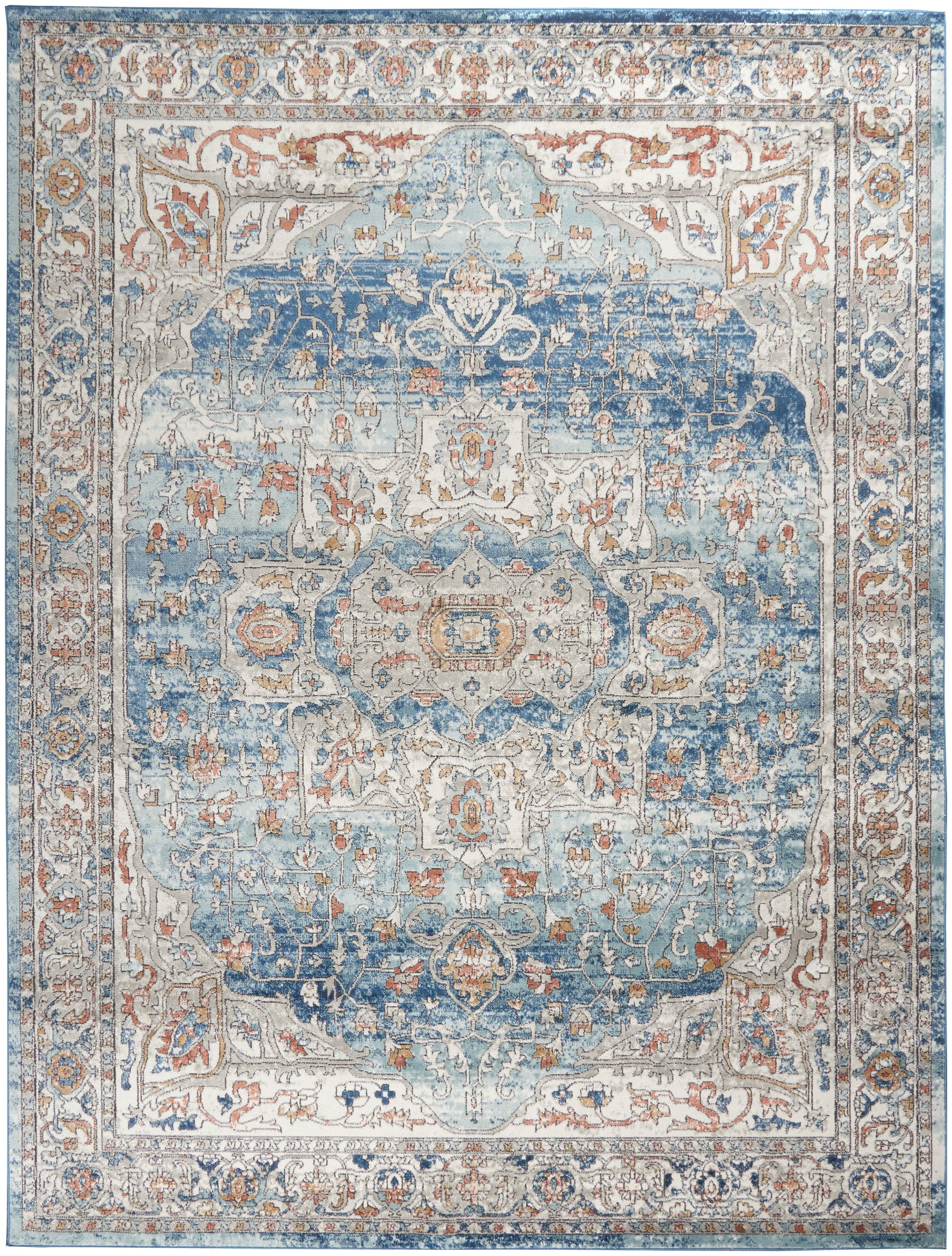 Persian-inspired area rug in blue, ivory, and tan with an ornate floral medallion center and detailed border.