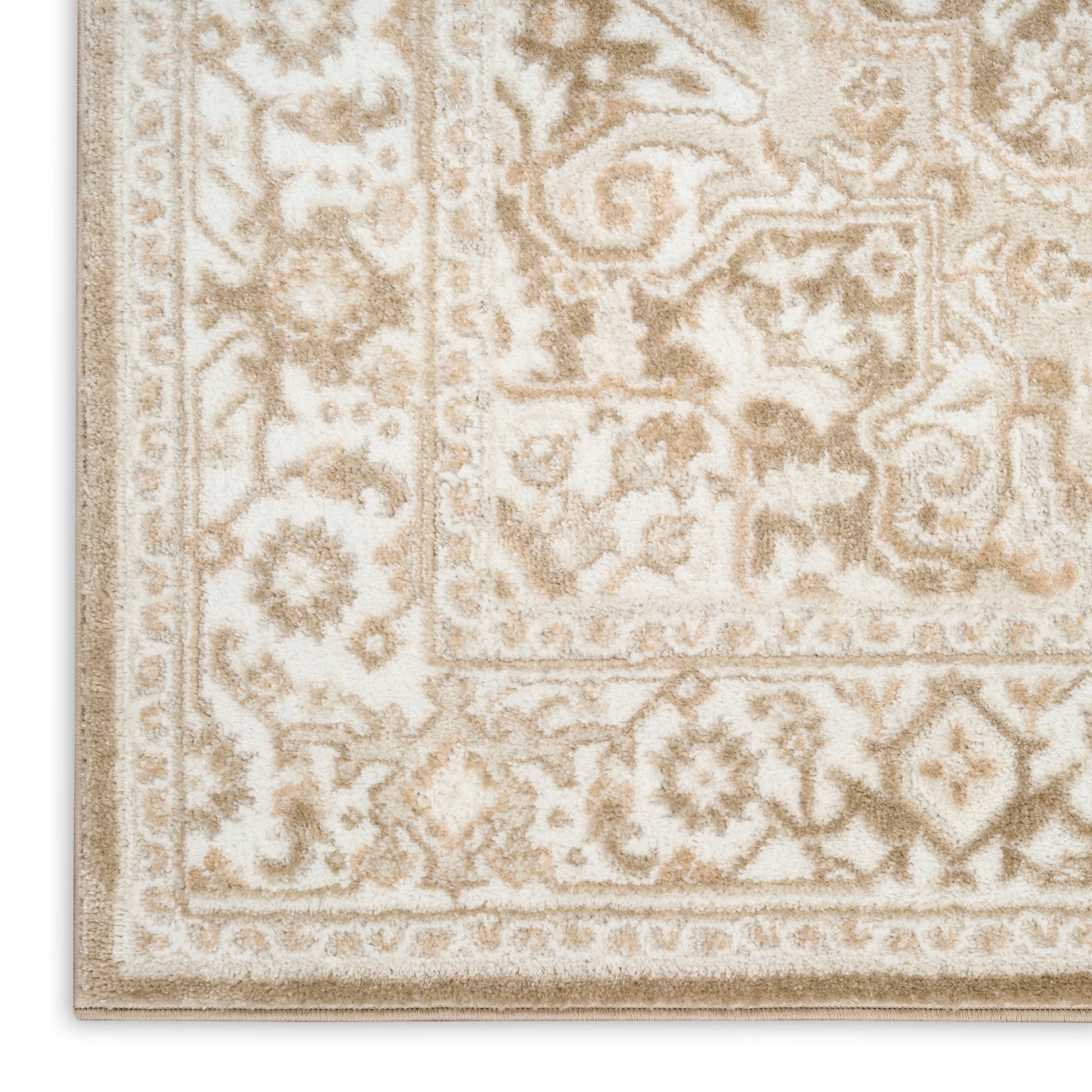 Cream & taupe oriental rug with ornate floral border & plush tufted pile for living room decor.