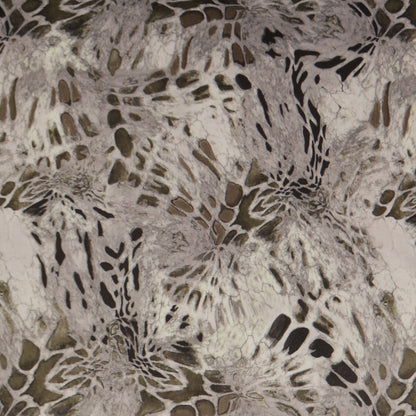 Beige pillow fabric with abstract brown-taupe swirls and leaf-like motifs in a marbled pattern.