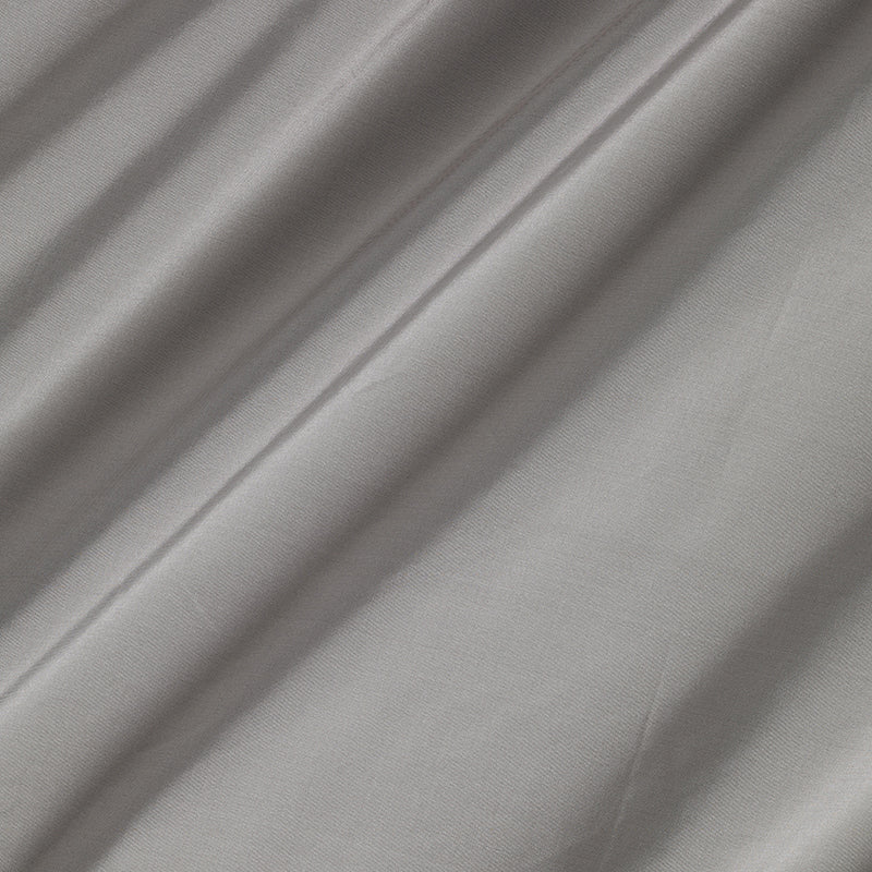 Gray satin-like fabric with soft diagonal folds and subtle sheen