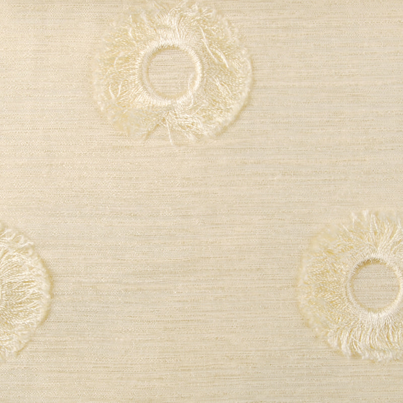 Cream-beige textured upholstery fabric with circular embroidered rosette motifs.