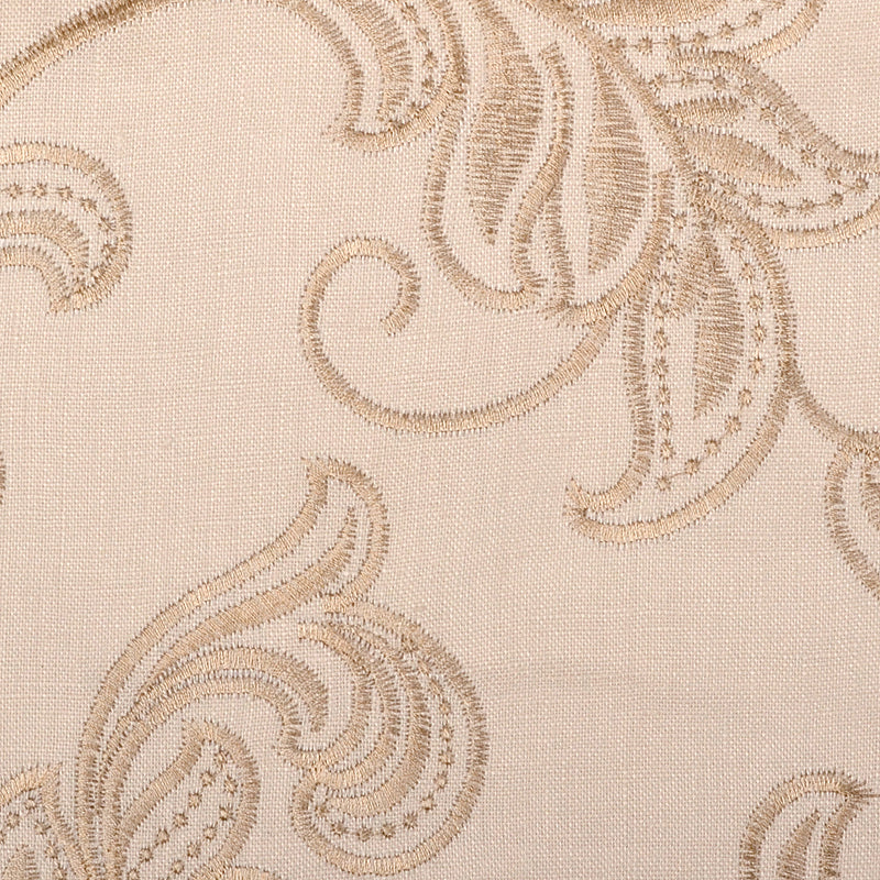 Beige damask fabric with tan embroidery featuring swirling floral scroll motifs.