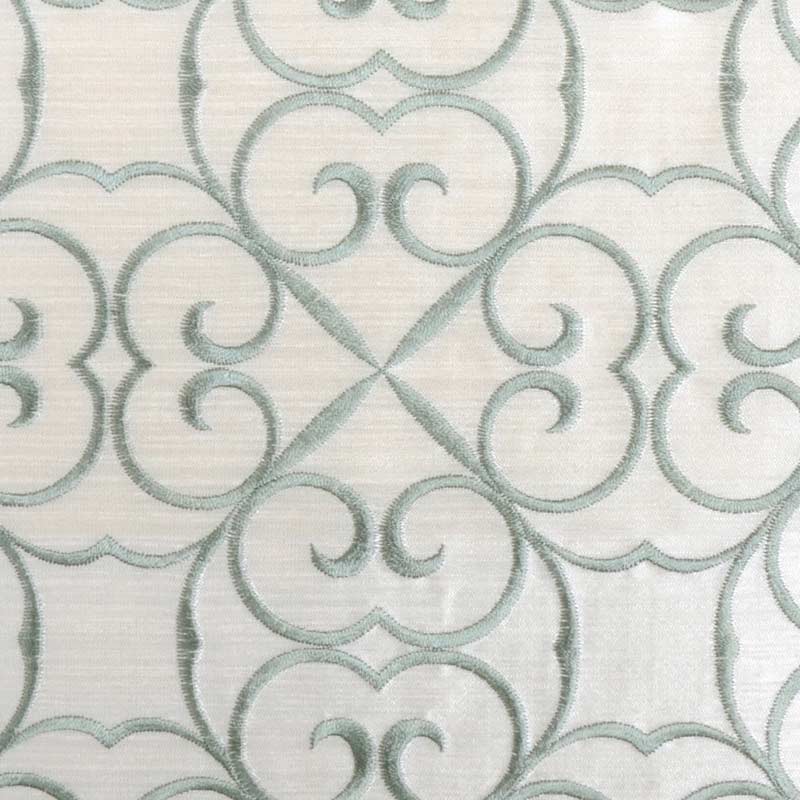 Aqua damask scroll pattern on ivory linen-like upholstery fabric; repeating symmetrical quatrefoil motifs.