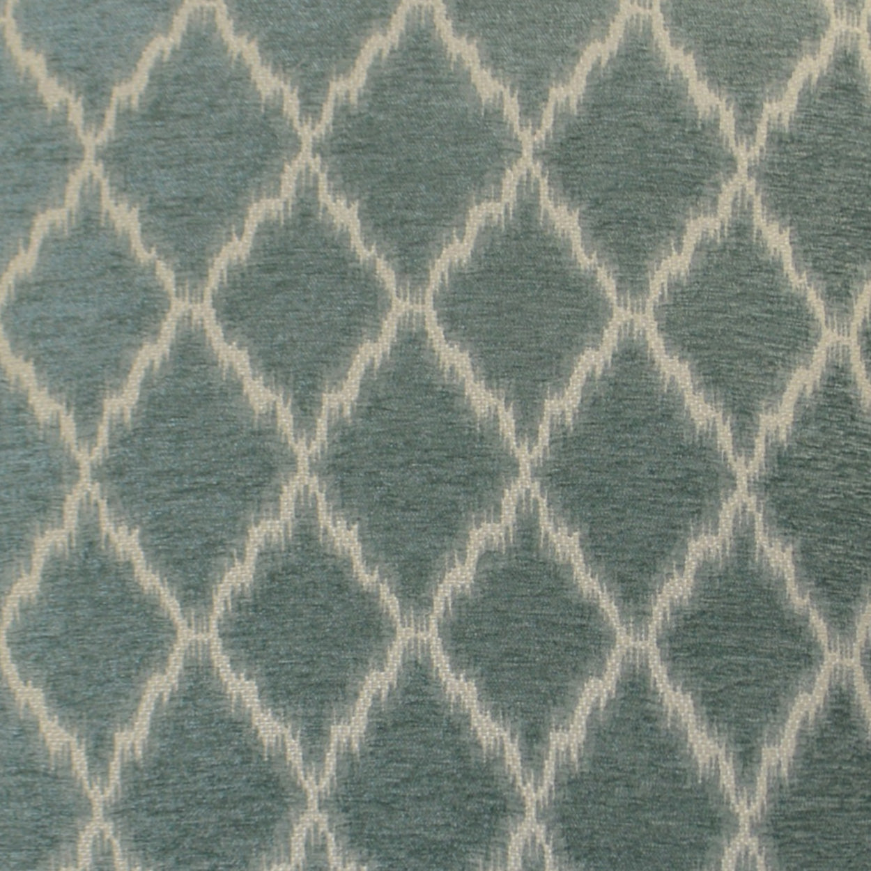 Blue-gray woven fabric with cream diamond lattice trellis pattern; soft upholstery or drapery textile.