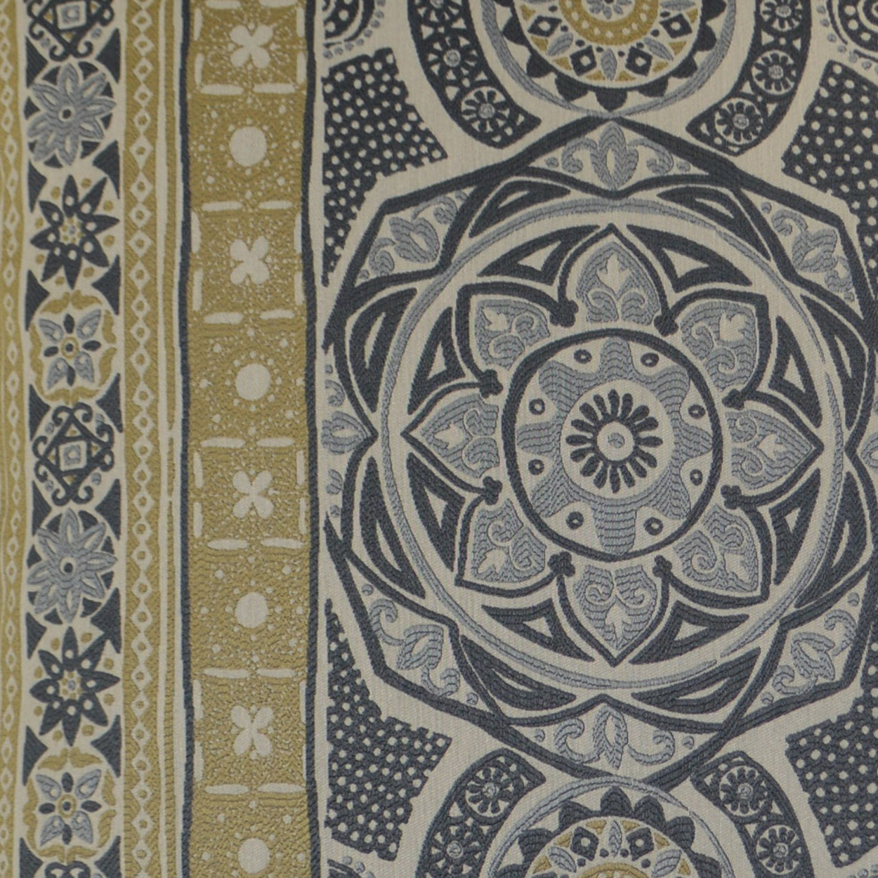 Decorative fabric with navy, gold and ivory mandala pattern; circular floral rosettes and geometric borders.