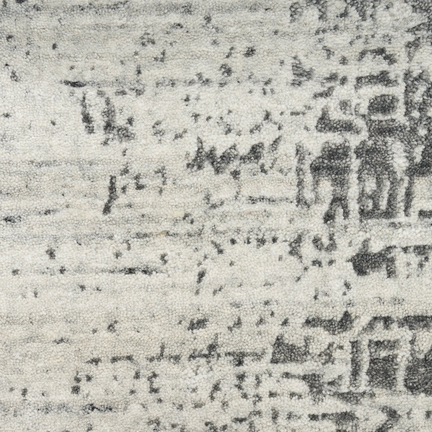 Grayscale close-up of a textured rug surface with speckled, mottled shading and faint horizontal lines, modern 8' x 10' rug.
