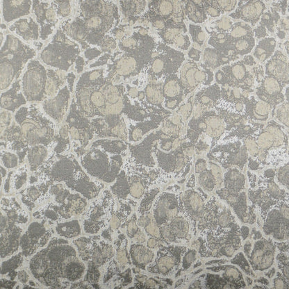 Gray-silver terrazzo-pattern pillow with a modern abstract design.