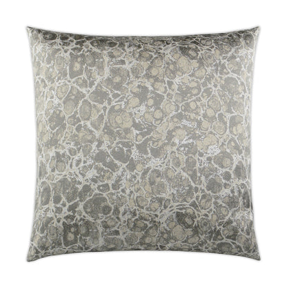 Square decorative pillow with terrazzo pattern in gray; textured neutral tones for sofa.