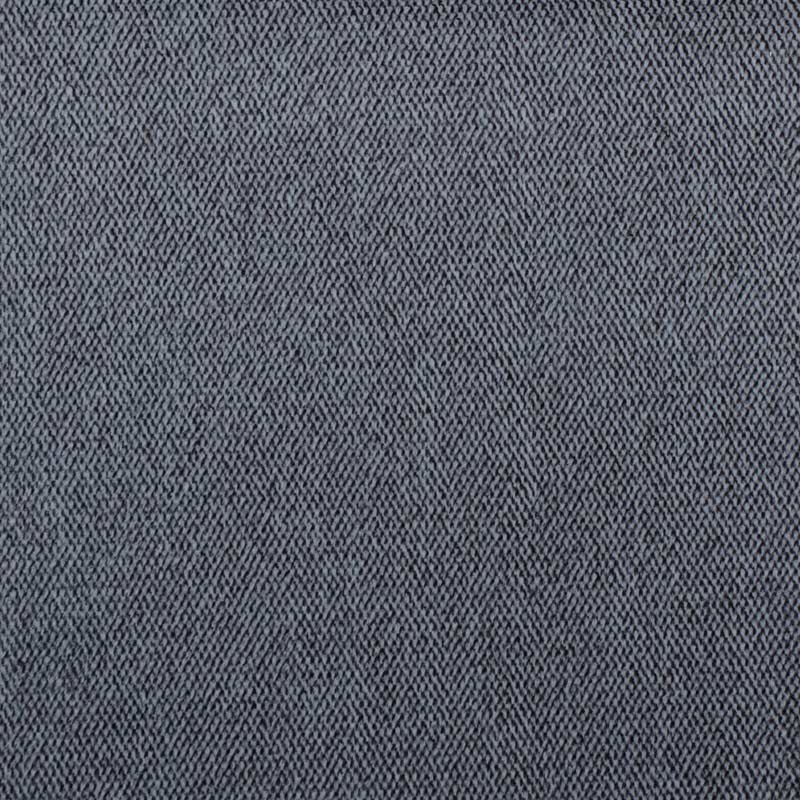 Close-up of indigo blue upholstery fabric with diagonal twill weave and textured surface.