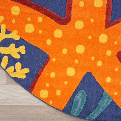 Bright orange and blue round outdoor rug with yellow dot accents and teal leaf motifs.