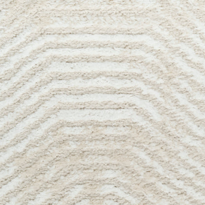 Cream shag rug with raised chevron pattern; soft plush texture ideal for living room or bedroom decor.