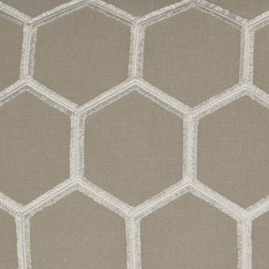Taupe fabric with white hexagon lattice embroidery; geometric honeycomb pattern.