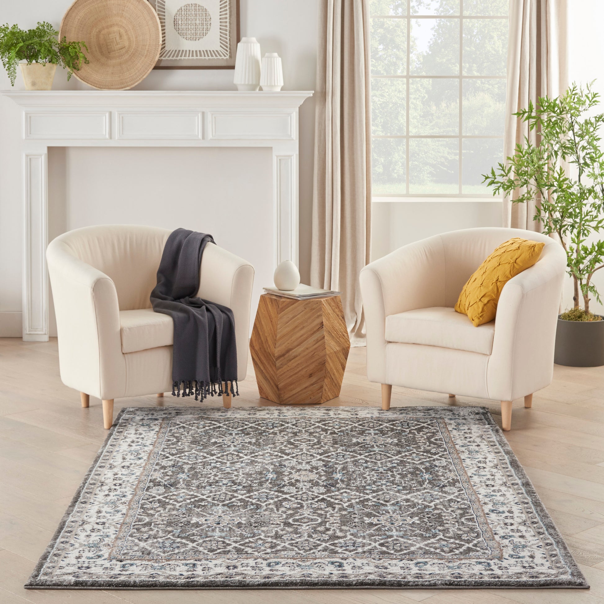 Gray patterned rug in a bright living room.