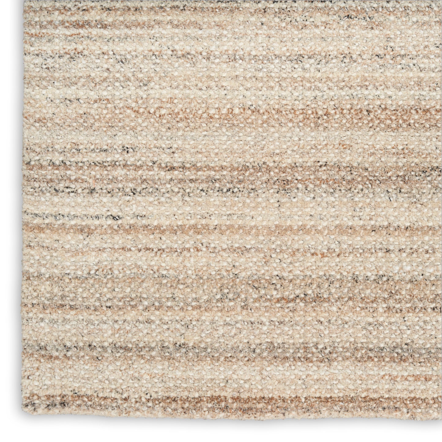 Beige striped textured rug with soft loop pile in light tan and cream tones.