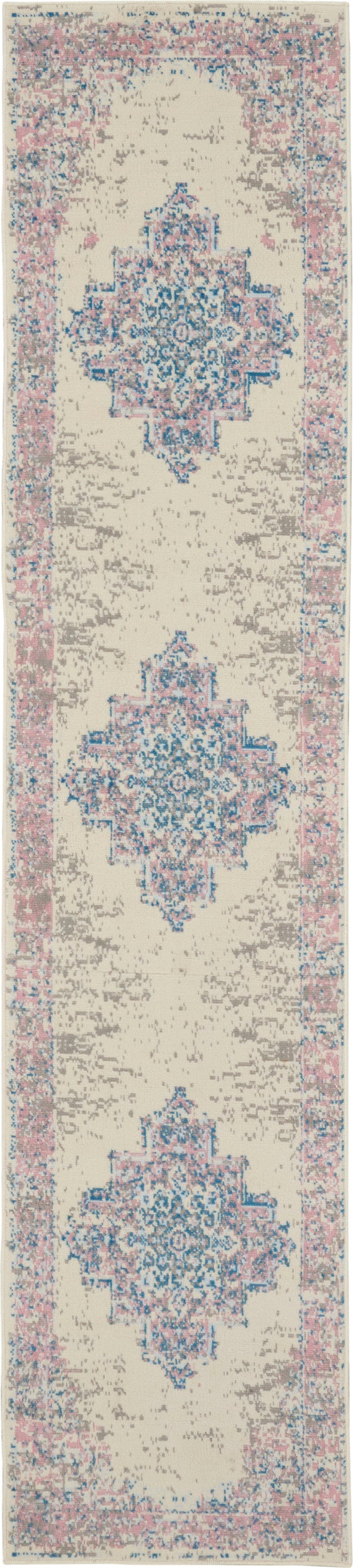 Beige runner rug with blue geometric medallions and pink border in a vintage Persian-inspired pattern.