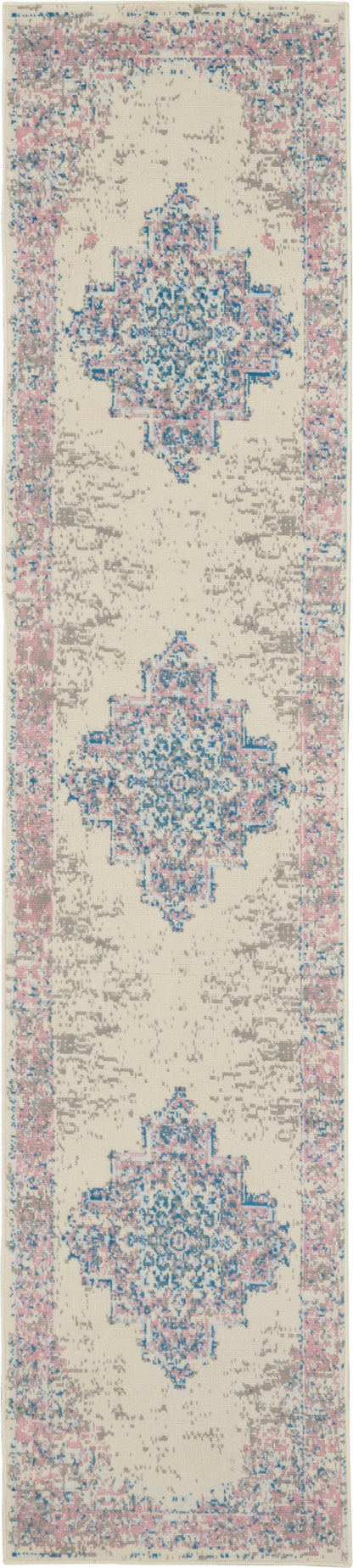 Beige runner rug with blue geometric medallions and pink border in a vintage Persian-inspired pattern.