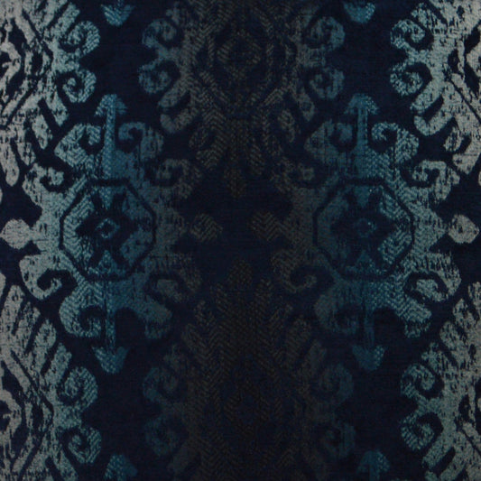 Navy jacquard damask fabric with teal ornate motifs and rich woven texture for upholstery or curtains.