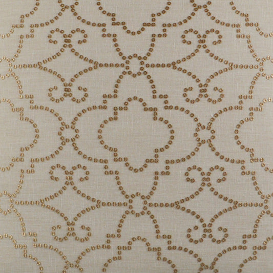Cream fabric with gold-tone bead embroidery in an ornate lace-like pattern.