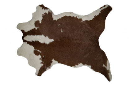 2' X 3' Brown And White Cowhide Cowhide Print Hand Tufted Area Rug