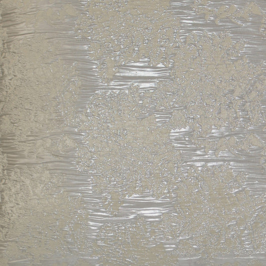 Beige textured jacquard fabric with embossed damask pattern and subtle metallic sheen.