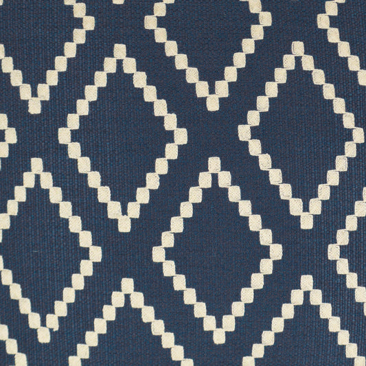 Navy blue woven fabric with a white stepped-diamond lattice pattern; geometric textile for upholstery or cushions.