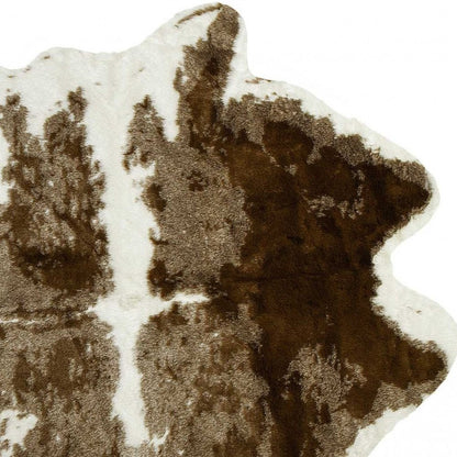 4' X 5' Brown And White Cowhide Print Hand Knotted Area Rug