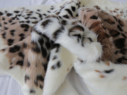 4' X 5' Ivory Black And Brown Faux Fur Animal Print Washable Area Rug