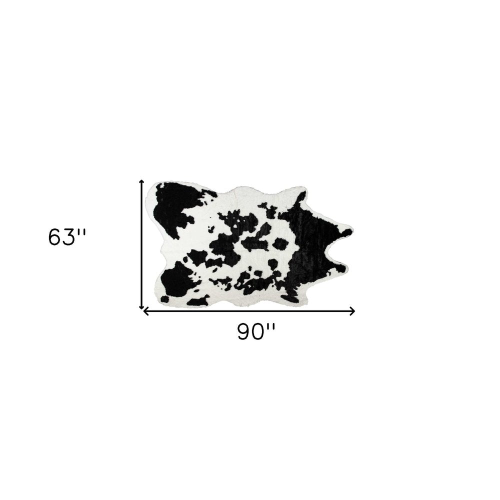5' X 8' Black And White Cowhide Print Washable Area Rug