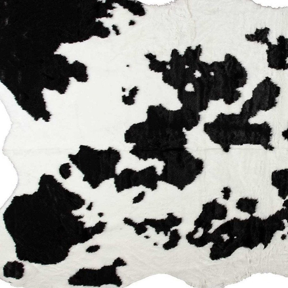 5' X 8' Black And White Cowhide Print Washable Area Rug