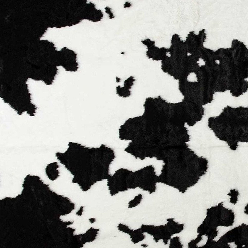 5' X 8' Black And White Cowhide Print Washable Area Rug