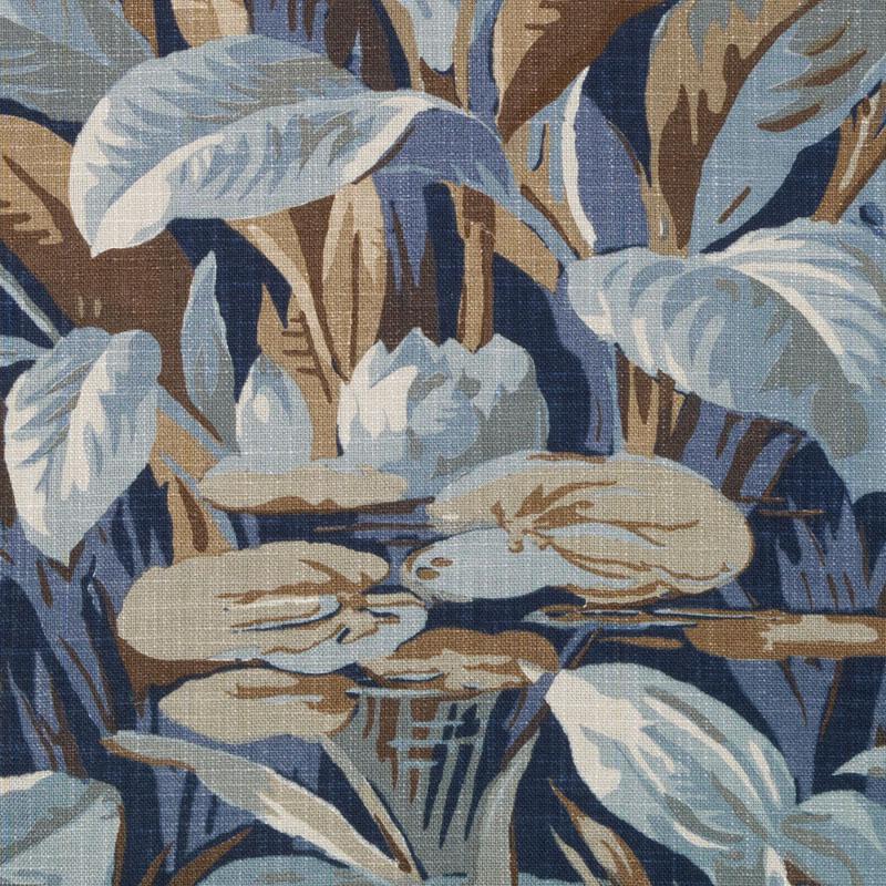 Woven textile with blue, brown and taupe oversized leaves in an abstract botanical pattern.