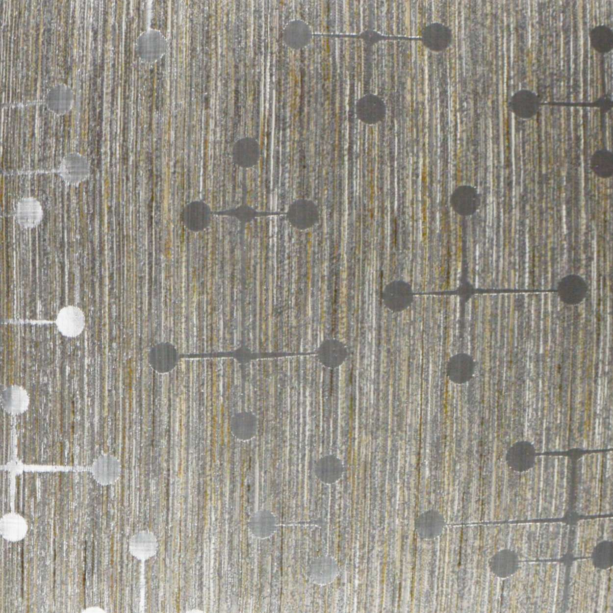 Pillow with textured fabric featuring metallic gold threads and a dotted circuit-like pattern of gray circles linked by short lines