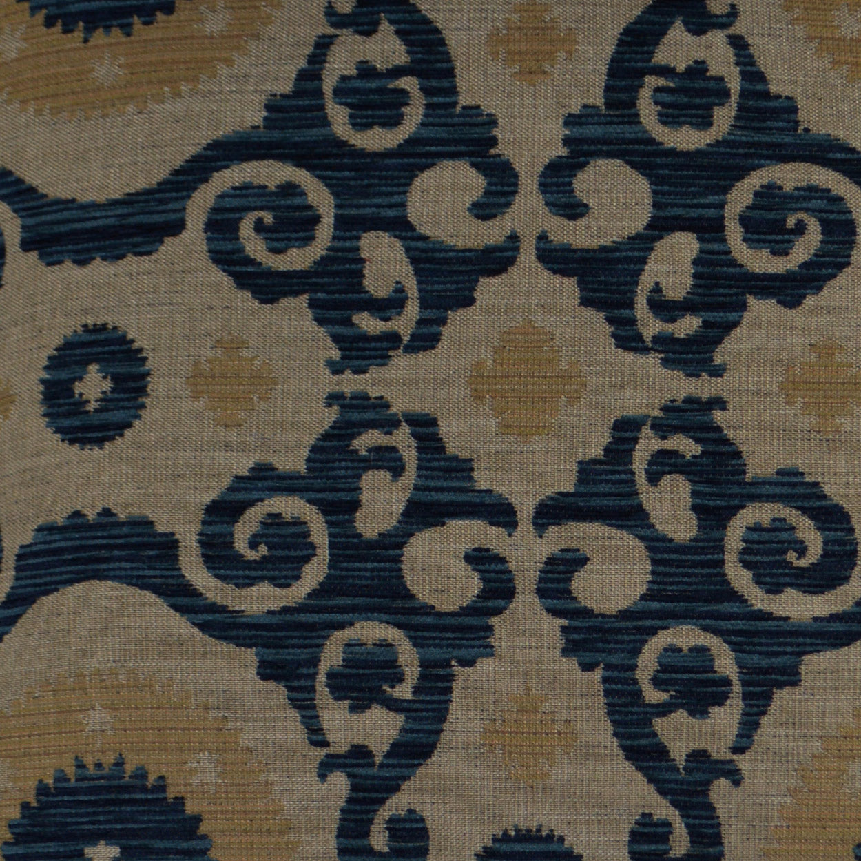Beige woven damask fabric with navy blue scrolling motifs and gold medallion accents.