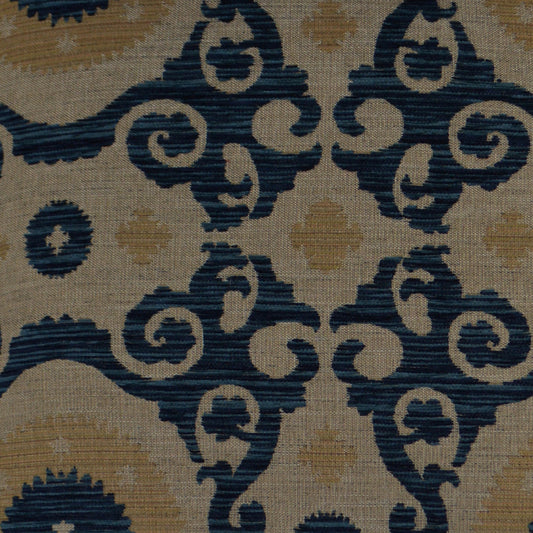 Beige woven damask fabric with navy blue scrolling motifs and gold medallion accents.