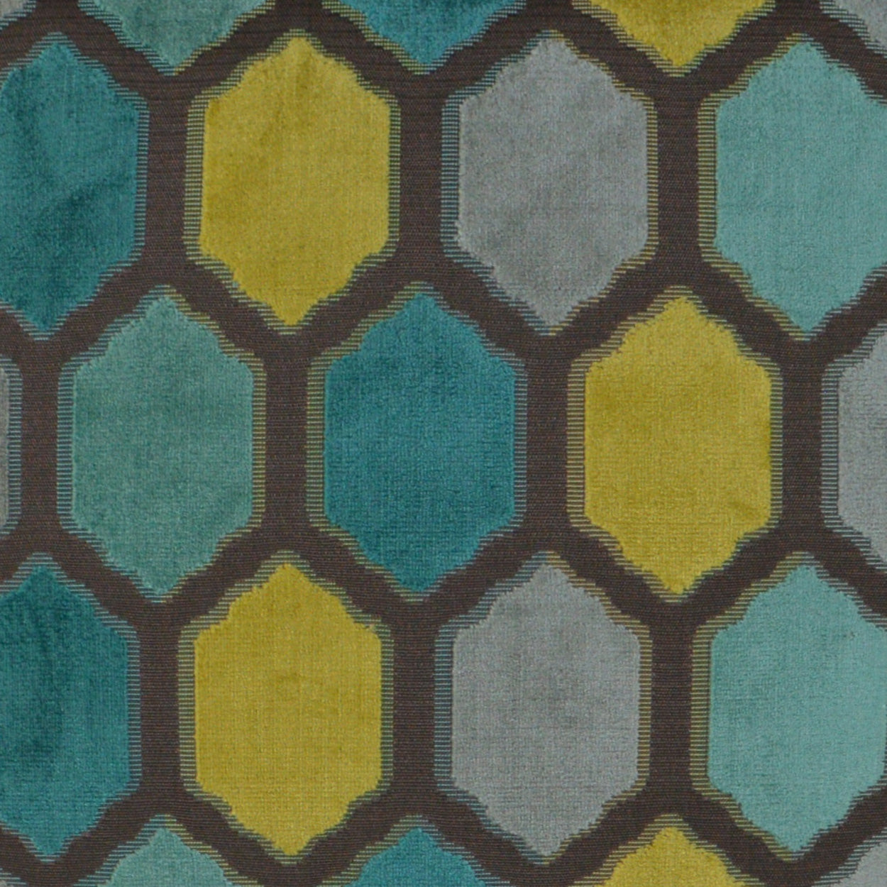 Geometric diamond lattice patterned fabric in teal, mustard yellow and gray with dark brown outlines.