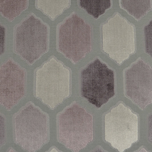 Velvet-like fabric with a hexagon lattice pattern in muted mauve, taupe and cream on sage backdrop.