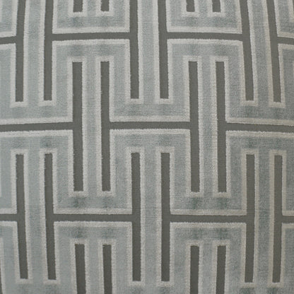 Gray fabric with interlocking Greek key pattern in light and dark gray; upholstery or drapery textile.