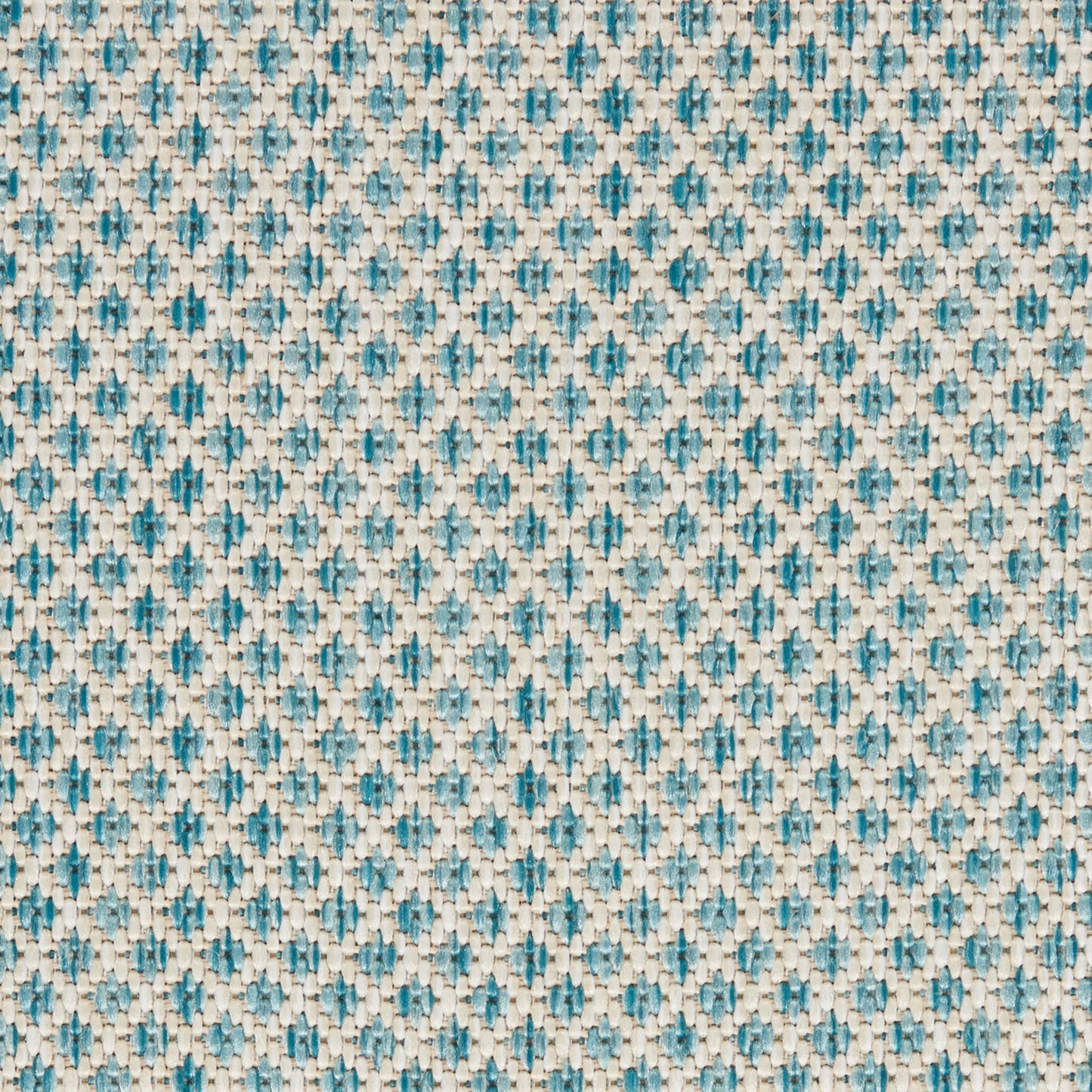 Close-up of woven fabric with blue-teal and cream threads in a small geometric pattern; textile texture.