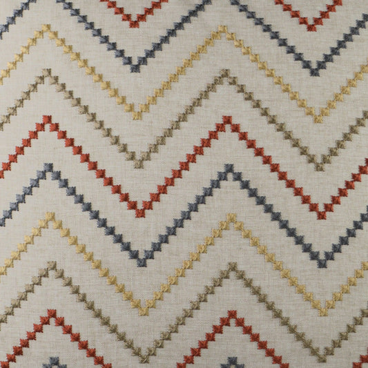 Chevron zigzag fabric pattern on light background with mustard, red, gray & navy chevrons.