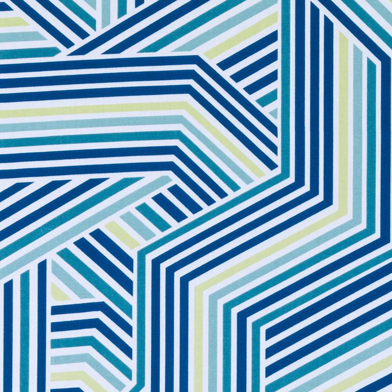 Geometric striped fabric in blues with teal and pale yellow, creating a maze-like angular pattern.