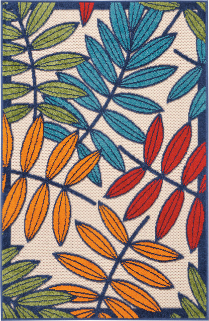 Rectangular tufted area rug with bold multicolor leaf pattern in blue/teal, green, orange and red on beige with a navy border.