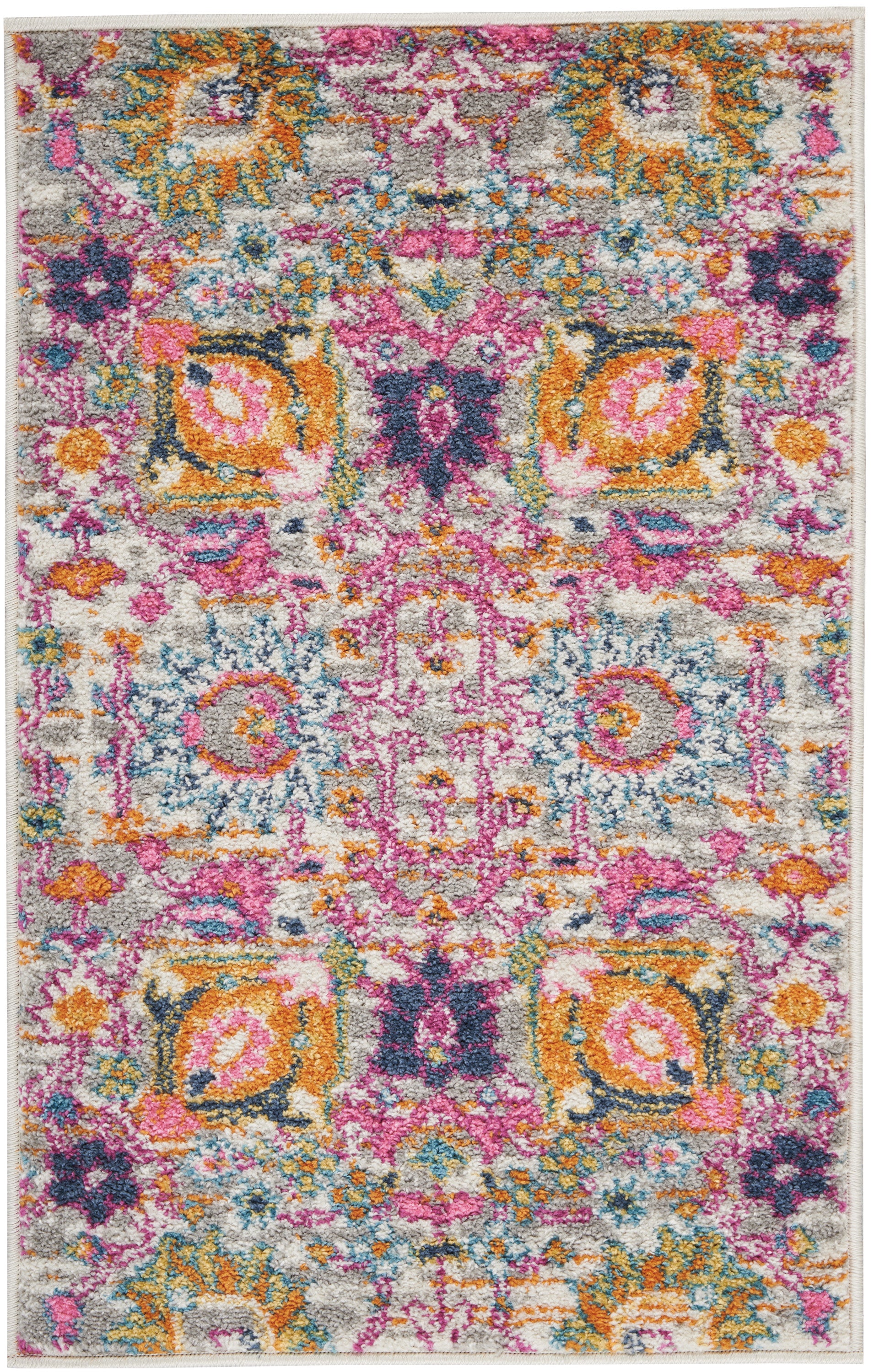 Vibrant boho rug with pink, orange, teal and purple floral medallions on light gray; plush, rectangular area rug.