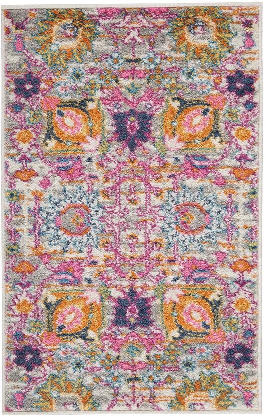Vibrant boho rug with pink, orange, teal and purple floral medallions on light gray; plush, rectangular area rug.