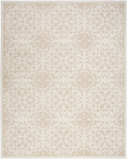 Cream-beige area rug with repeating pale taupe starburst floral mandala motifs and a delicate border.