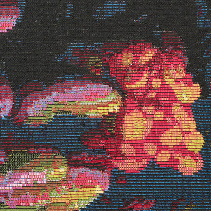 Vibrant floral rug with pink and yellow flowers, green leaves on a dark navy woven background; embroidery-style decor.
